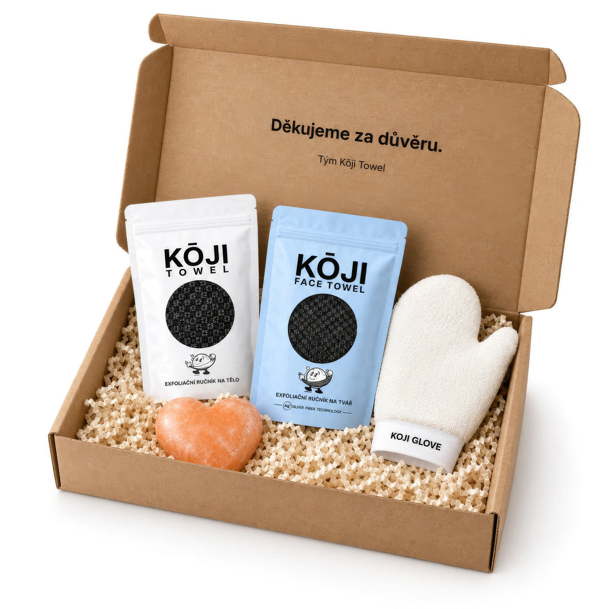 Otvorená darčeková krabica Kōji so štyrmi produktmi, pohľad z troch štvrtín.